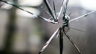 glass-window-broken-bullet